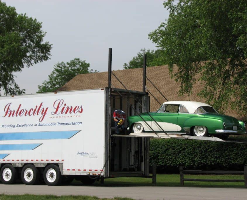 GE & Intercity Lines shipping a classic car