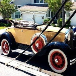 classic car on lift gate